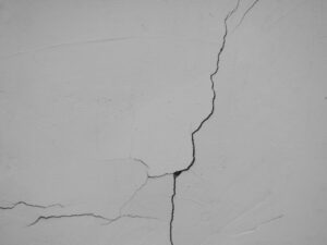 Hairline Cracks vs. Structural Stucco Damage: What’s the Difference?